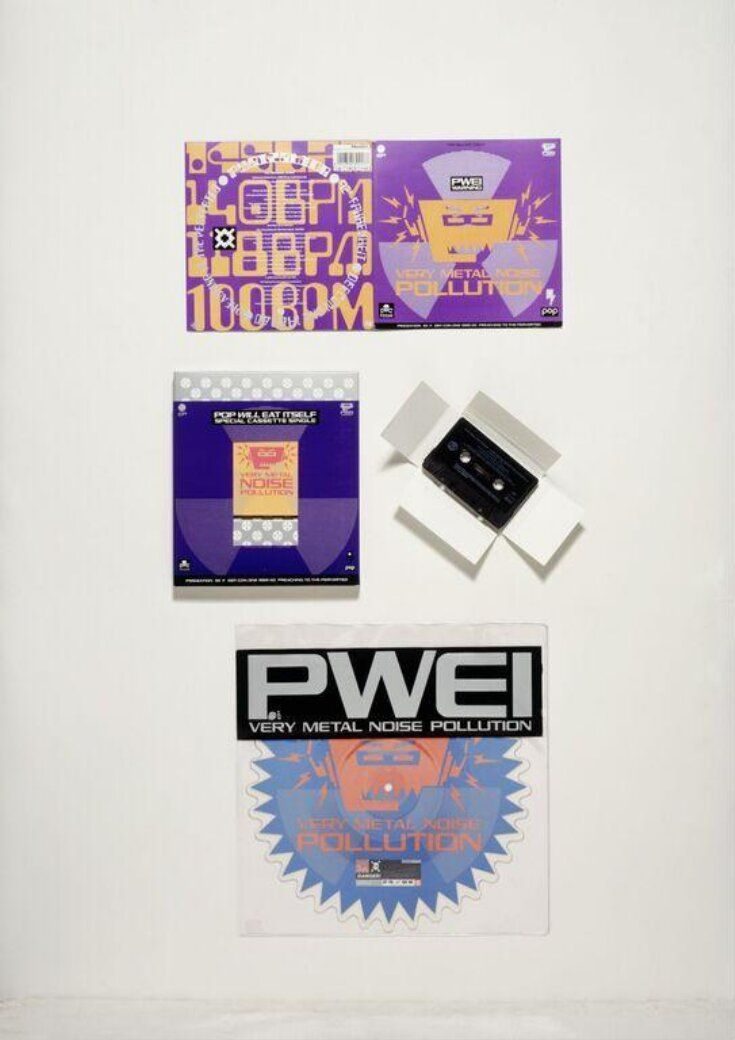 The Designers Republic — Pop Will Eat Itself Very Metal Noise Pollution sleeve, 1989, orange robot head on purple ground