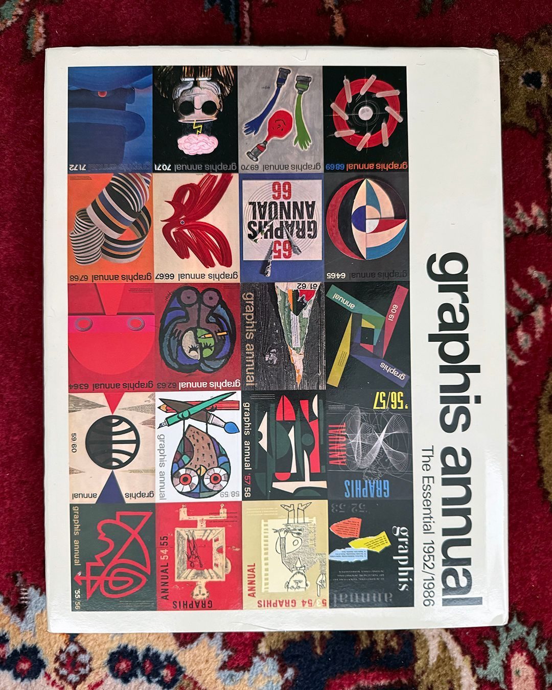 Cover of Graphis Annual, the essential compilation 1952–1986, showing a grid of colourful historic Graphis Annual covers