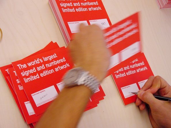 Million Edition postcards being signed and numbered at Whitechapel Gallery, Daniel Eatock Foundation 33, 2002